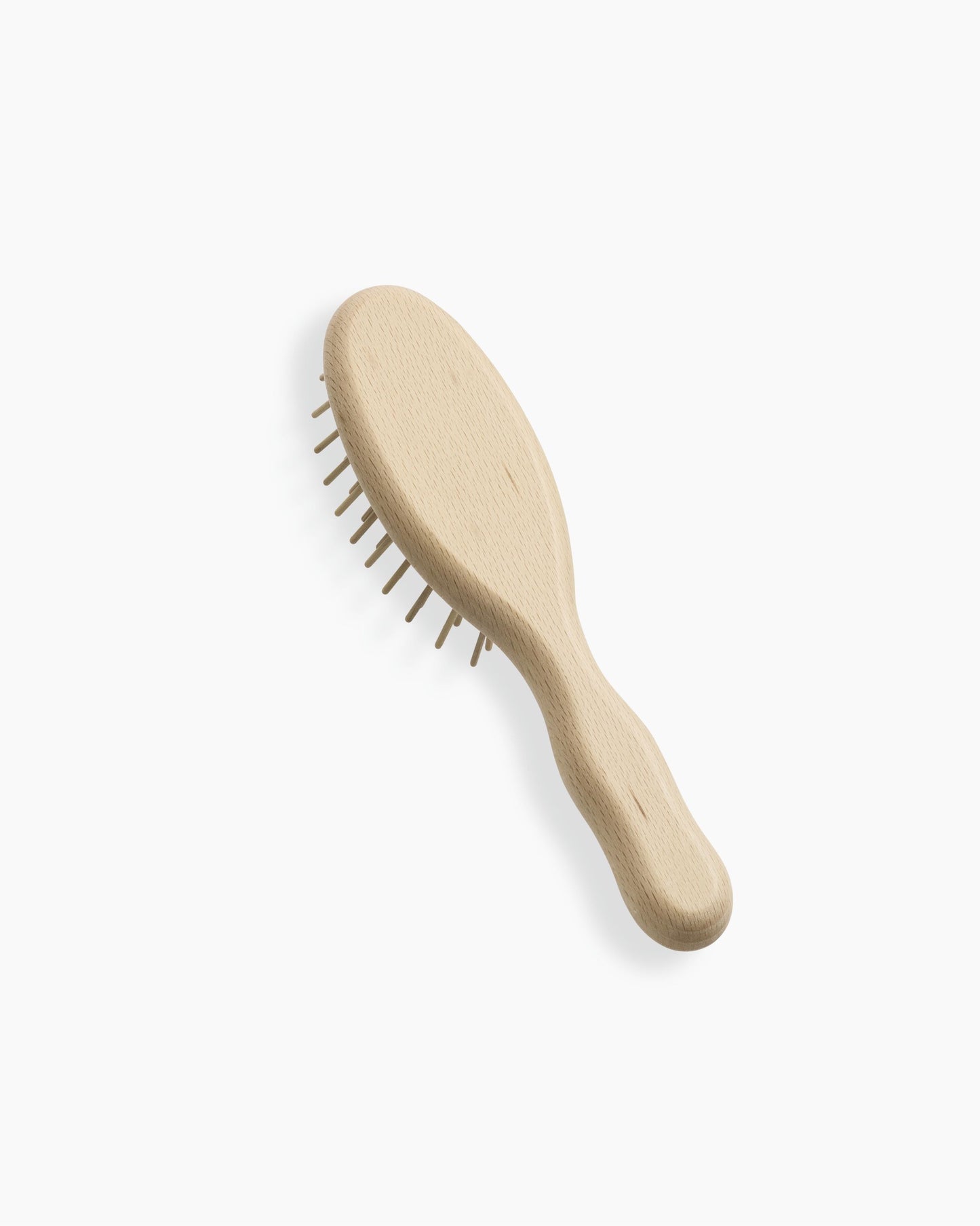 Brosse de voyage ovale en Hêtre avec picots de bois