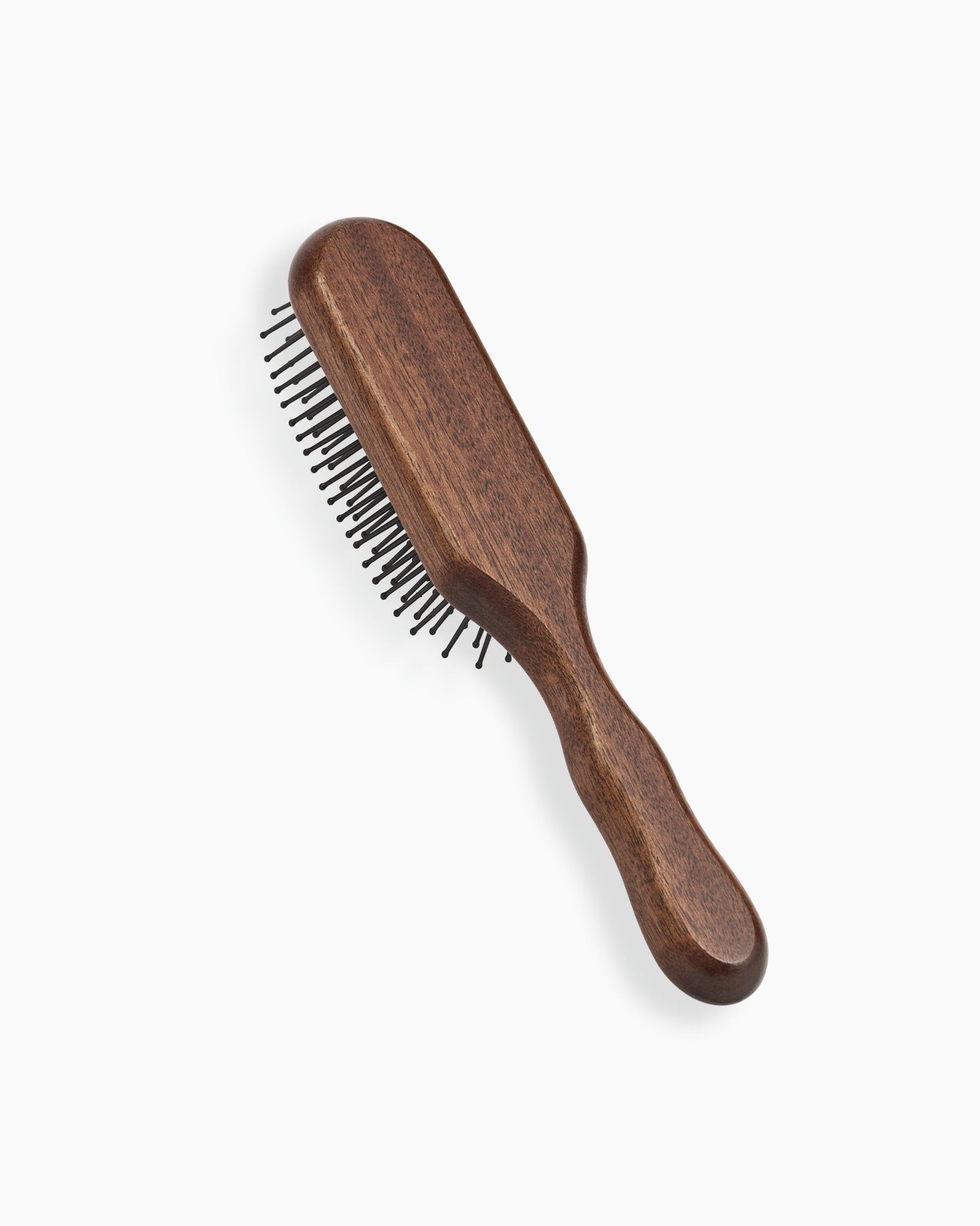 Brosse pneumatique avec broches résistantes à la chaleur