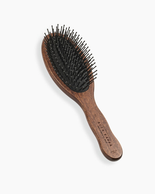 Brosse pneumatique avec broches résistantes à la chaleur