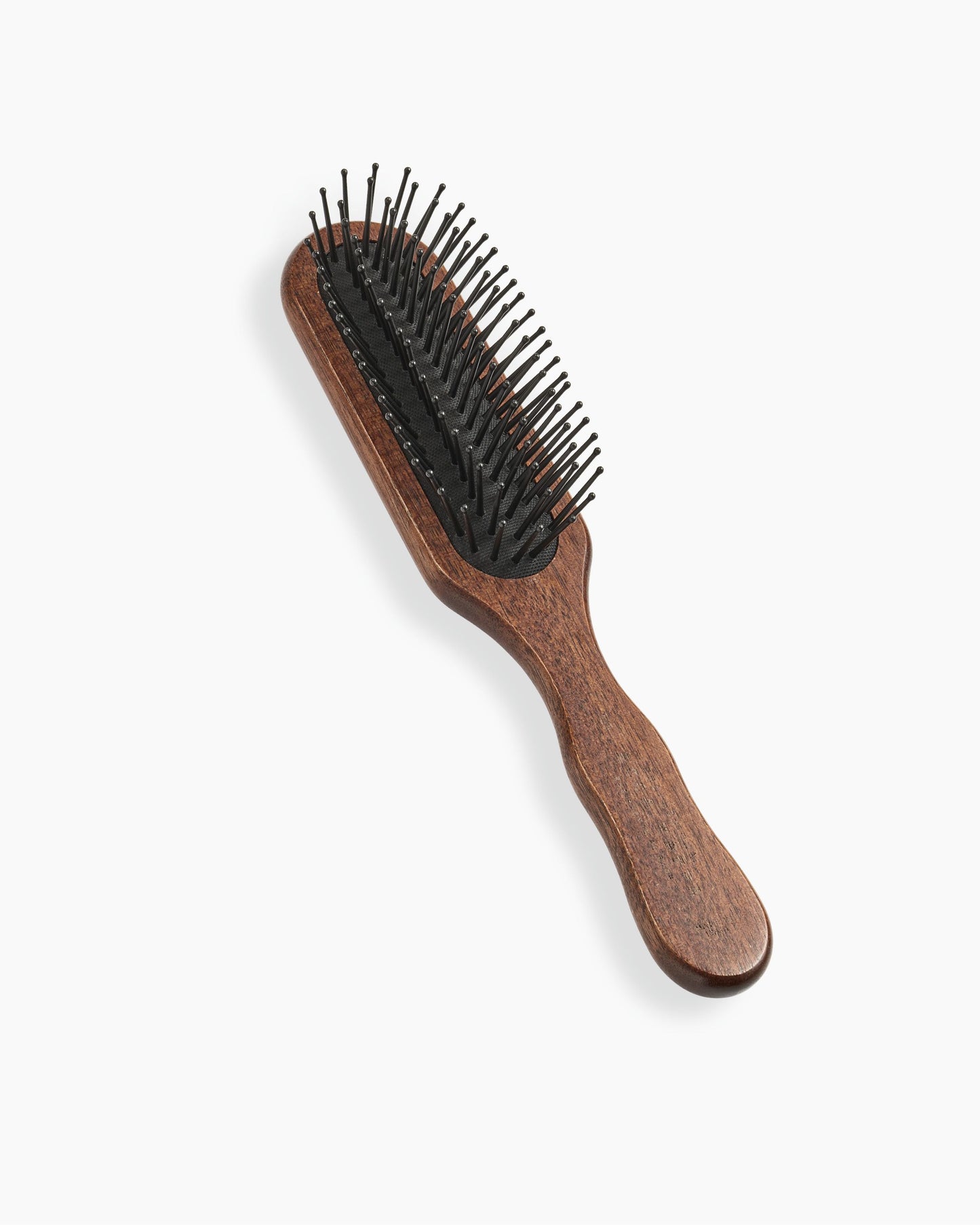 Brosse pneumatique avec broches résistantes à la chaleur